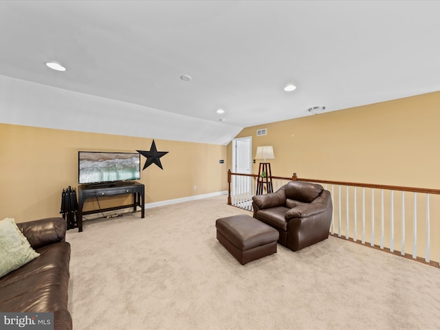 living area with visible vents, recessed lighting, carpet, baseboards, and vaulted ceiling