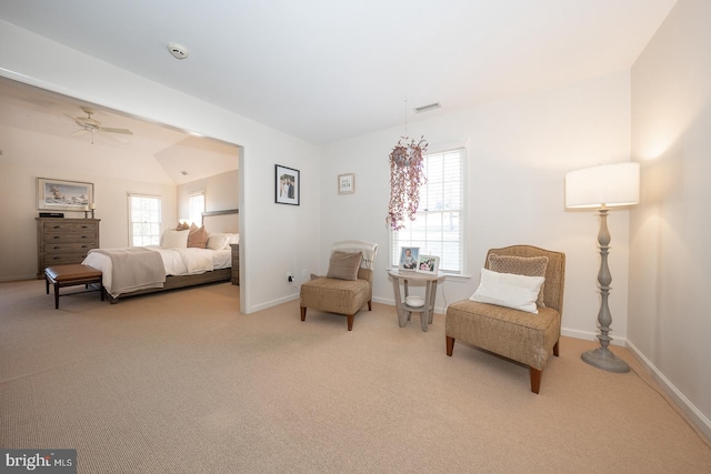 bedroom featuring carpet, multiple windows, visible vents, and baseboards