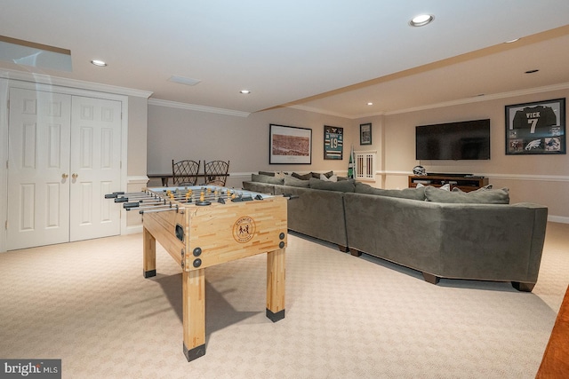 game room with light carpet, ornamental molding, and recessed lighting