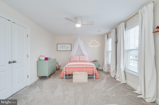 unfurnished bedroom featuring ceiling fan, carpet floors, and baseboards