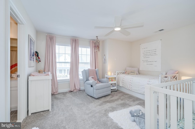 carpeted bedroom with ceiling fan