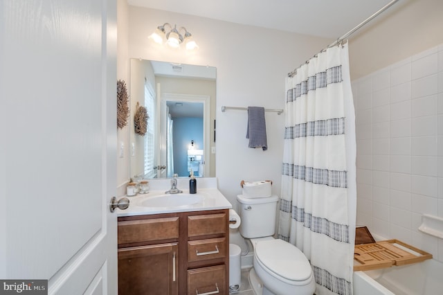 full bath with toilet, visible vents, and vanity