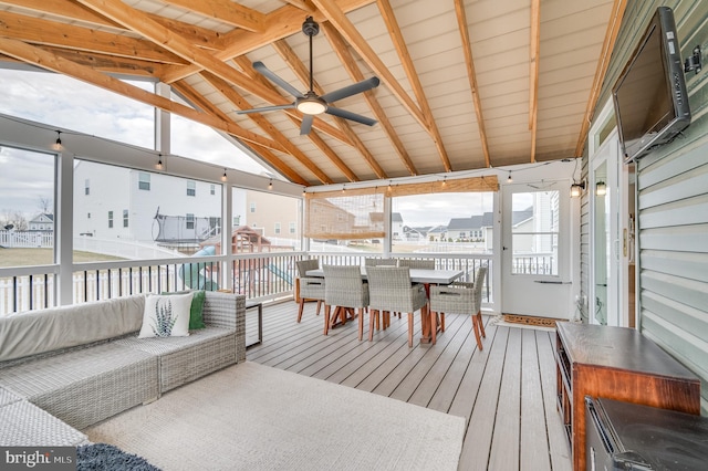 deck featuring outdoor dining area, ceiling fan, and an outdoor living space