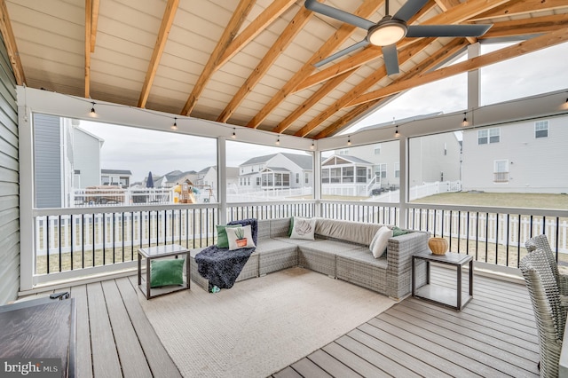 wooden deck featuring a ceiling fan, a residential view, and an outdoor hangout area