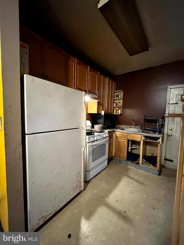 kitchen with open shelves, a sink, unfinished concrete floors, white appliances, and under cabinet range hood