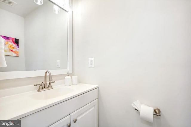 bathroom featuring visible vents and vanity