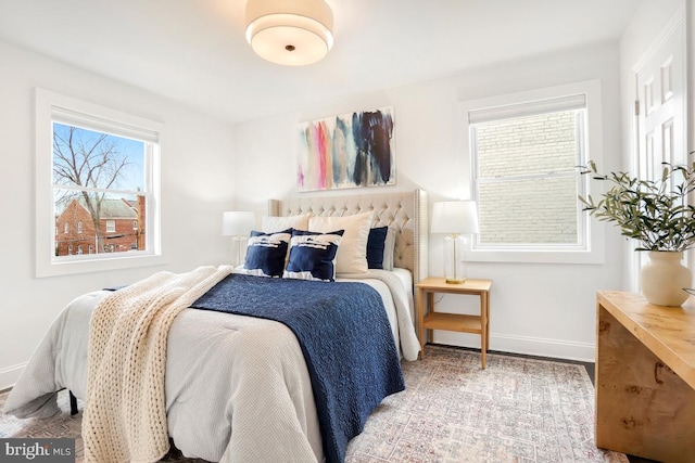 bedroom featuring baseboards