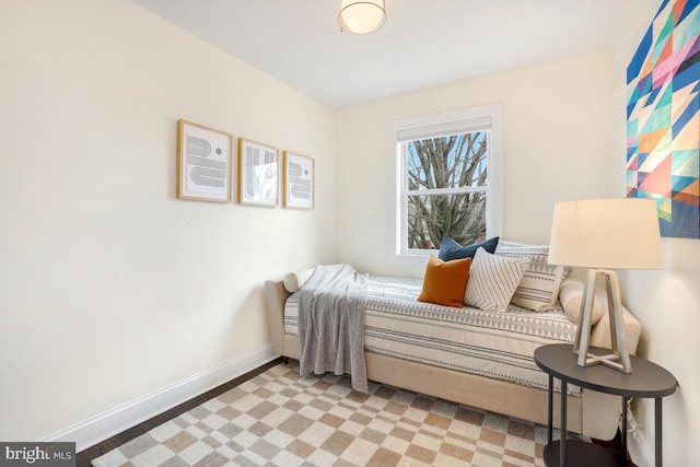 bedroom featuring baseboards