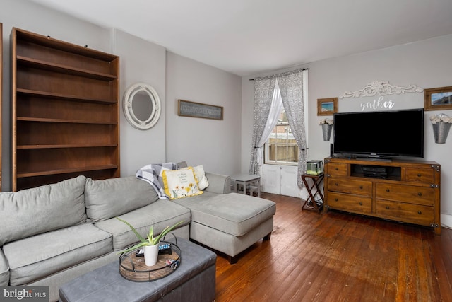 living room with dark wood-type flooring