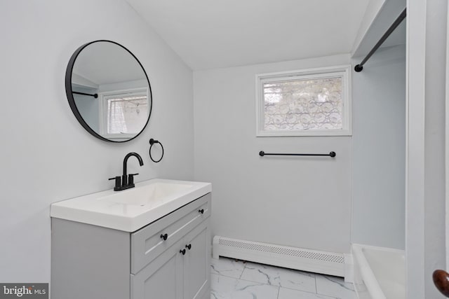 full bathroom with walk in shower, a tub to relax in, baseboard heating, marble finish floor, and vanity