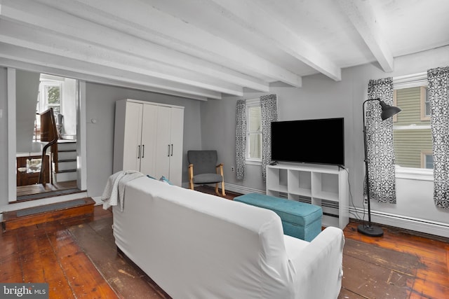 living room featuring hardwood / wood-style floors, beam ceiling, stairway, and baseboards