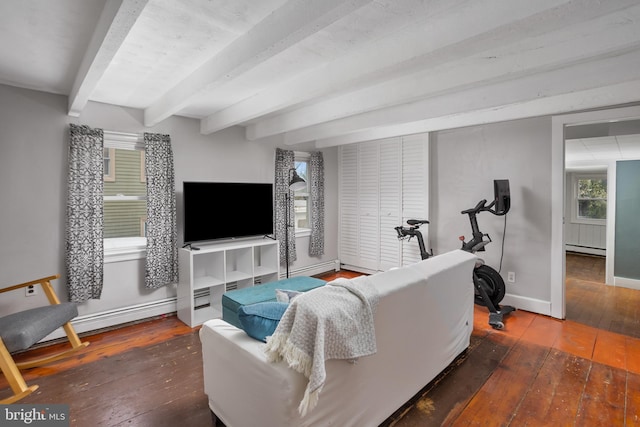 living area with hardwood / wood-style floors, baseboards, a baseboard heating unit, beamed ceiling, and baseboard heating