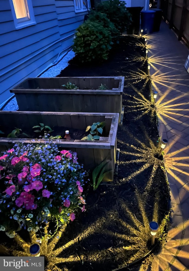 exterior details featuring a vegetable garden