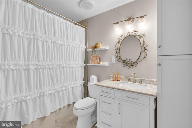 full bath featuring shower / bath combination with curtain, vanity, and toilet