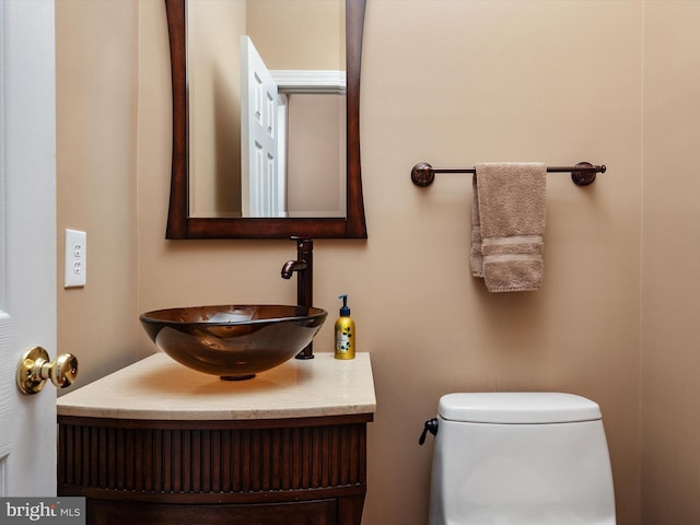 half bath with toilet and vanity