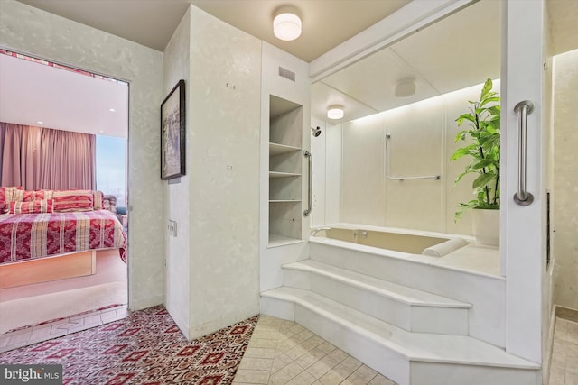 ensuite bathroom with visible vents and ensuite bathroom