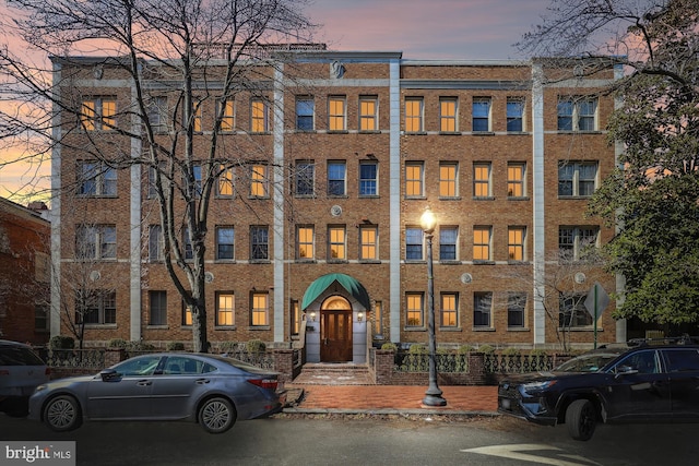 view of property at dusk