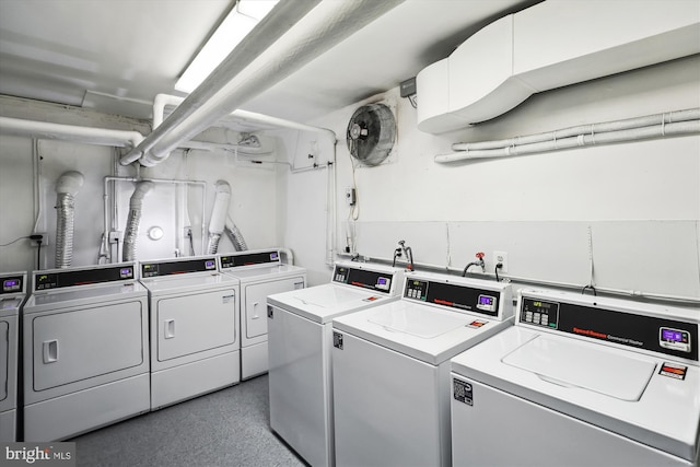 community laundry room with independent washer and dryer