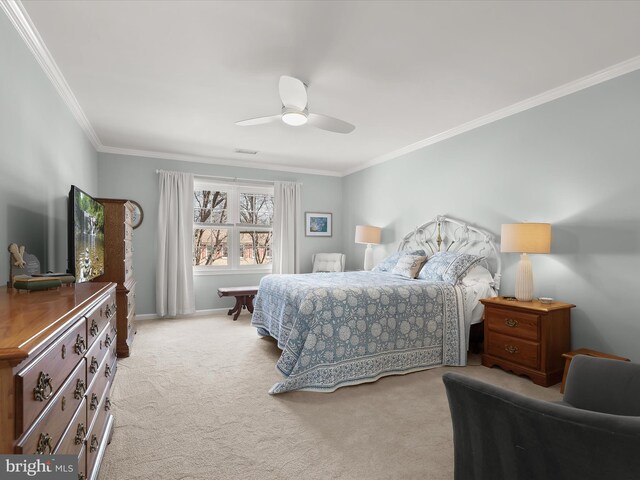 bedroom featuring light carpet, baseboards, ceiling fan, and crown molding