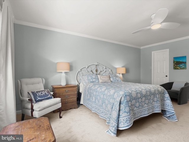 bedroom featuring carpet, crown molding, and a ceiling fan