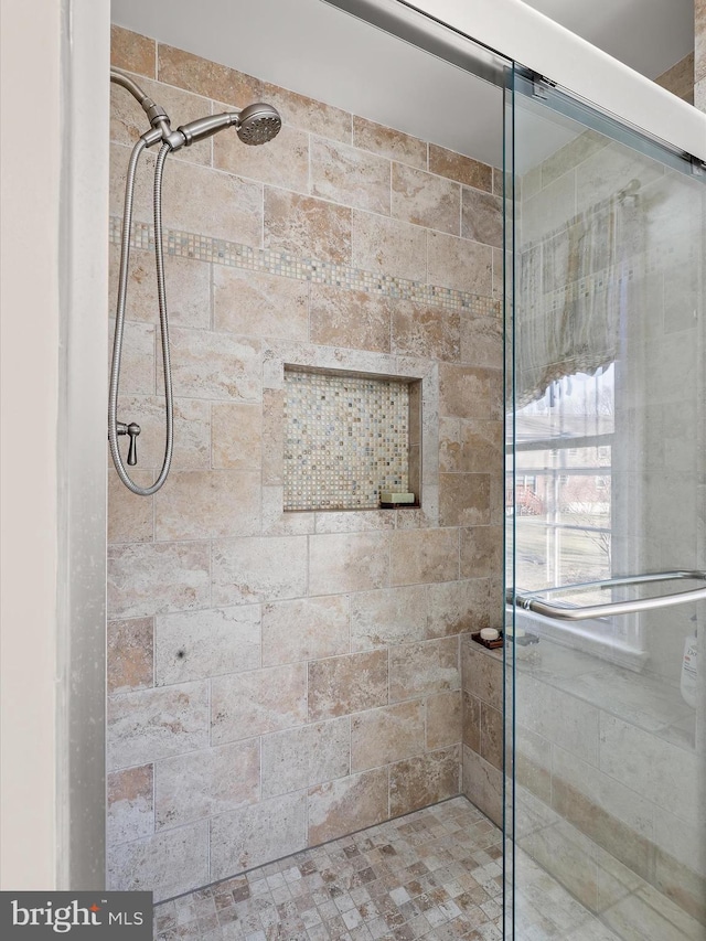 full bathroom with a shower stall