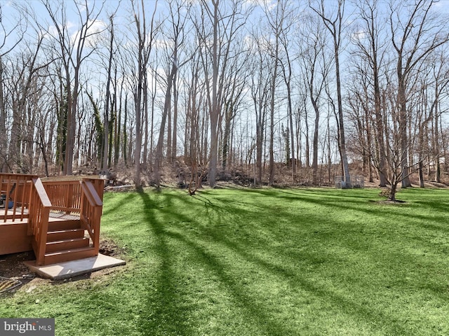 view of yard featuring a deck