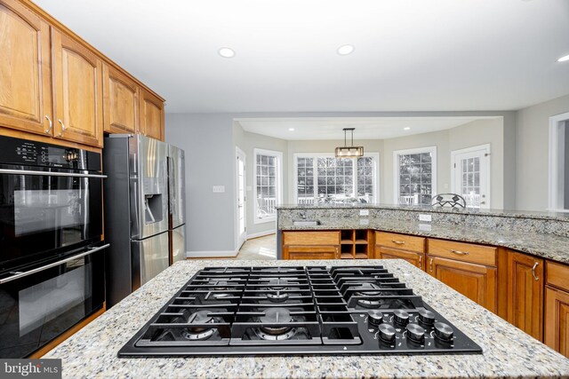 2729 Hollow View Dr, Finksburg, MD 21048 - kitchen with black appliances, recessed lighting, light stone countertops, brown cabinets, and baseboards