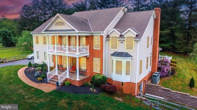 2729 Hollow View Dr, Finksburg, MD 21048 - view of front of property featuring a porch, a chimney, a balcony, central AC, and a shingled roof