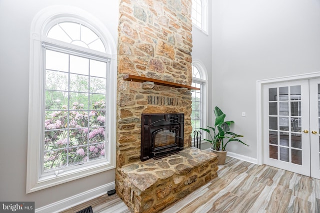 2729 Hollow View Dr, Finksburg, MD 21048 - living room with baseboards, french doors, a towering ceiling, and wood finished floors