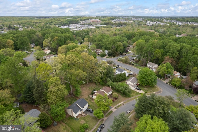 drone / aerial view with a view of trees
