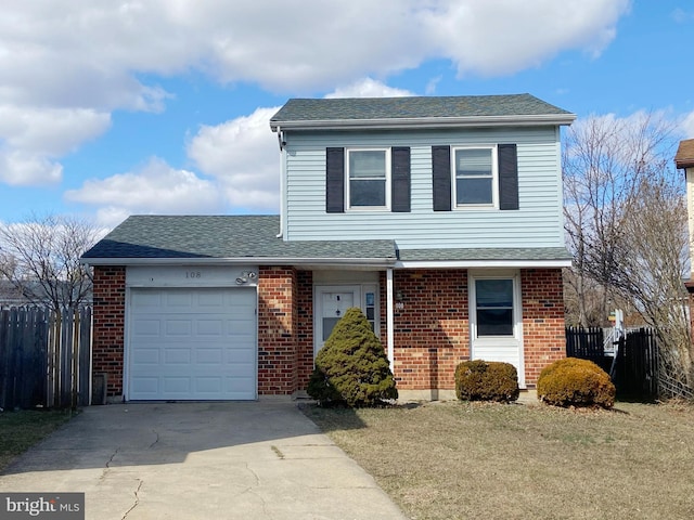 traditional-style house with concrete driveway, brick siding, fence, and an attached garage