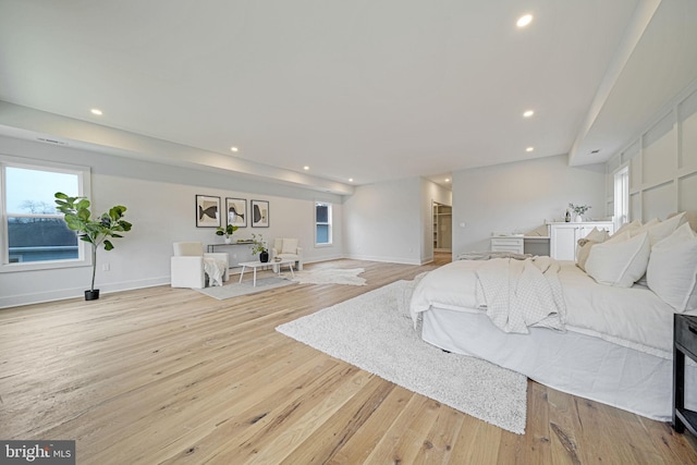 bedroom featuring recessed lighting, baseboards, and hardwood / wood-style floors