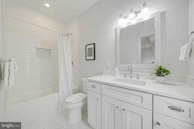 bathroom with vanity, tile patterned flooring, toilet, and shower / tub combo with curtain