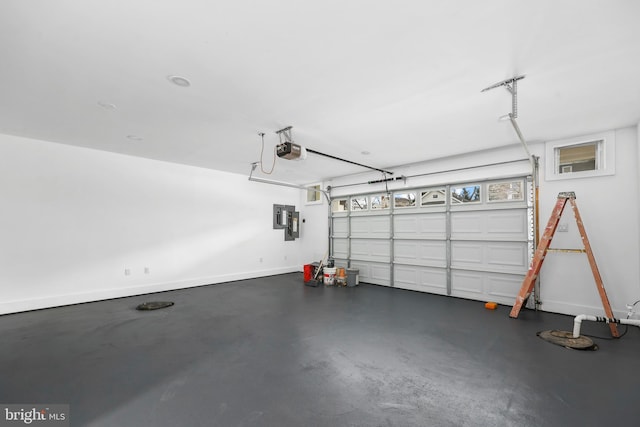 garage featuring baseboards and a garage door opener