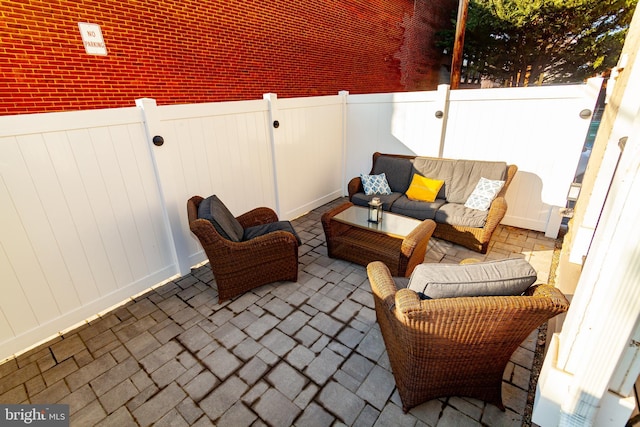 view of patio with a fenced backyard and an outdoor hangout area