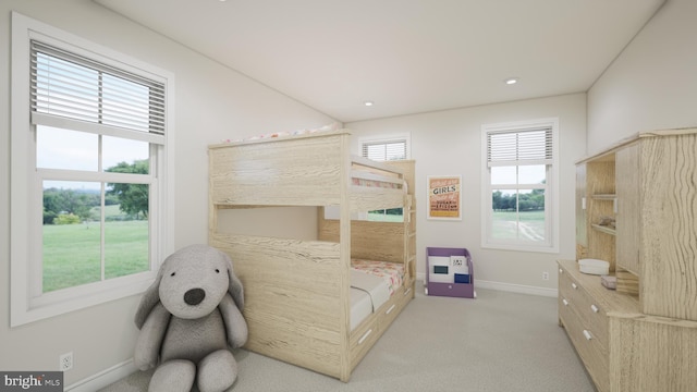 bedroom with light carpet, recessed lighting, and baseboards