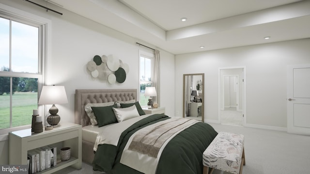 bedroom with ensuite bathroom, baseboards, recessed lighting, and carpet