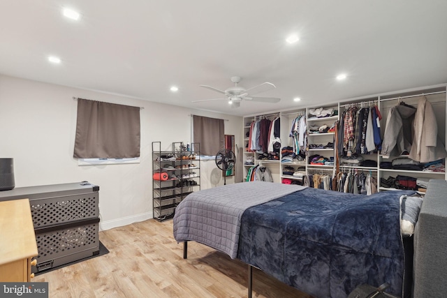 bedroom featuring a ceiling fan, recessed lighting, and wood finished floors