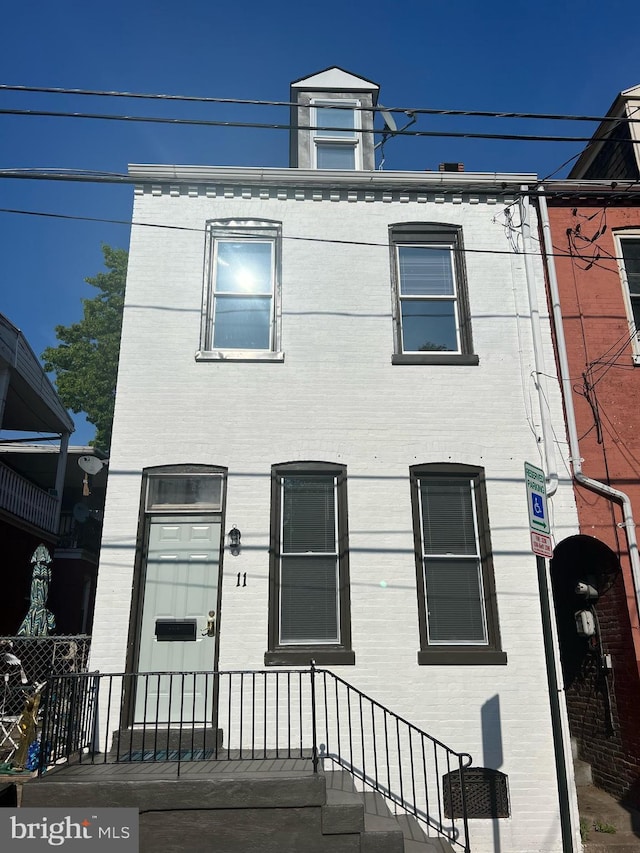 view of front of property with brick siding