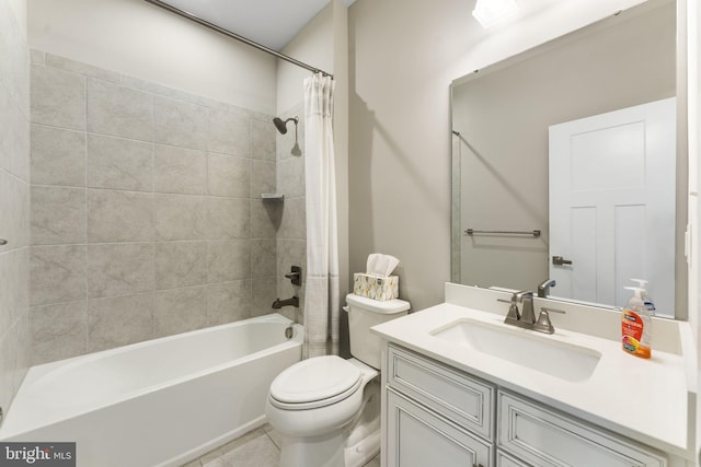 bathroom featuring toilet, tile patterned floors, shower / bath combination with curtain, and vanity