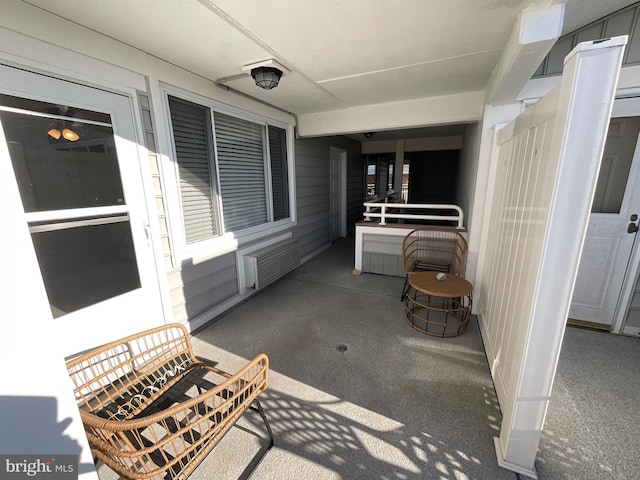 view of patio with radiator heating unit