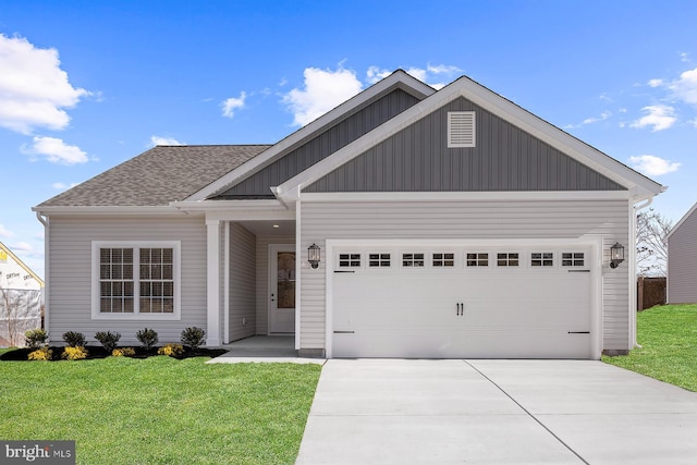 view of front of property featuring driveway, a shingled roof, an attached garage, board and batten siding, and a front yard