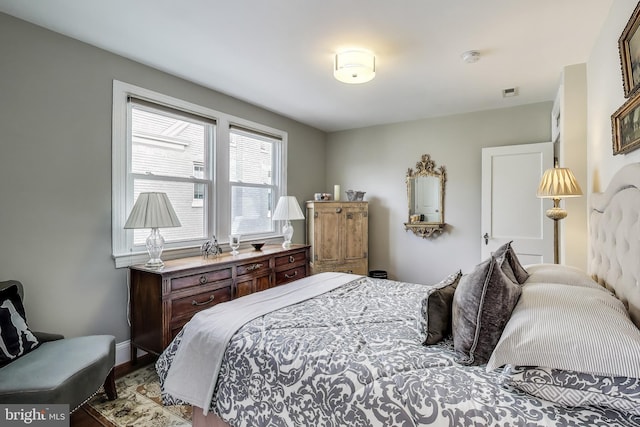 bedroom with visible vents