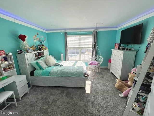 bedroom featuring ornamental molding and dark colored carpet