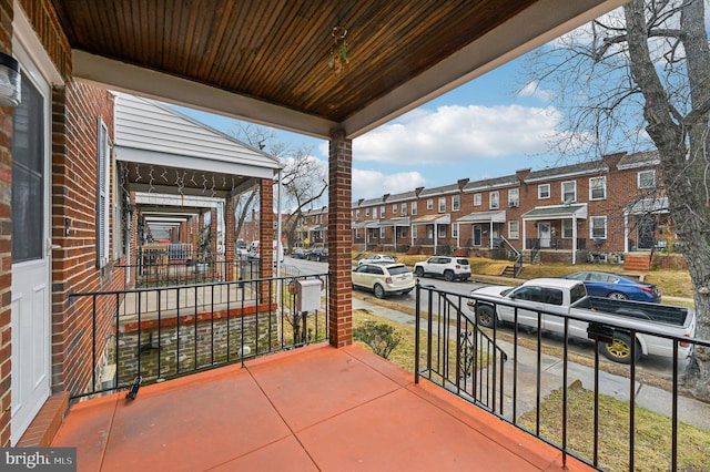 balcony featuring a residential view