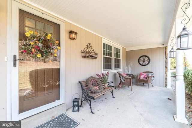 entrance to property with covered porch