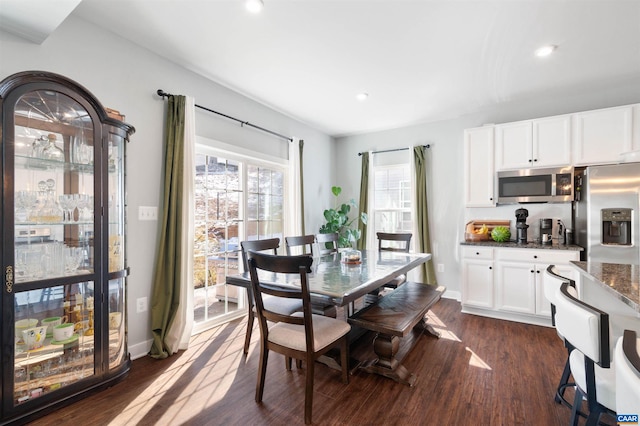 dining space featuring dark wood-type flooring, recessed lighting, and baseboards