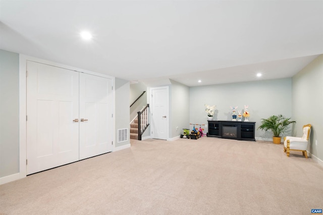 interior space featuring baseboards, carpet, visible vents, and recessed lighting