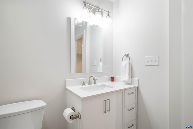 half bath with toilet and vanity