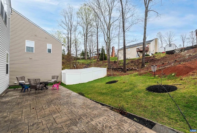 view of yard featuring a patio and fence